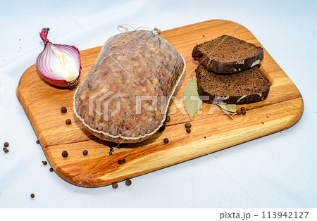 Tasty sausages and vegetables isolated over solid background Tasty sausages and vegetables isolated over solid background 113942127