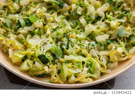 Sauteed cabbage in a cast iron pan, side dish idea Sauteed cabbage in a cast iron pan, side dish idea 113943422