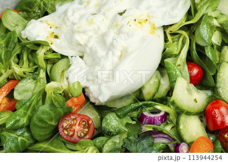 Diet salad with Burrata cheese, lettuce and vegetables 113944254