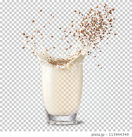 Flax milk splash nutty and creamy splashing out of a glass with whole flax seeds 113944349