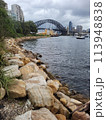 Sydney's harbour foreshore set against the famous Sydney Harbour bridge on a cloudy overcast day 113948838