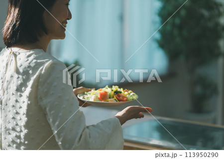 a forty-something woman a forty-something woman 113950290