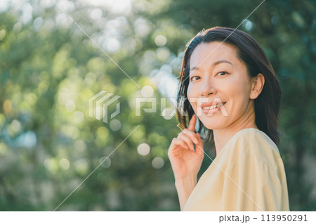a forty-something woman a forty-something woman 113950291