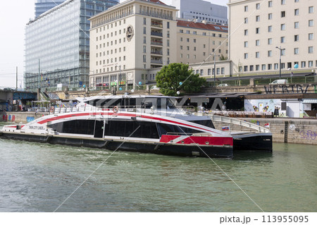 Pleasure boat on the Donaukanal canal in Vienna Pleasure boat on the Donaukanal canal in Vienna 113955095