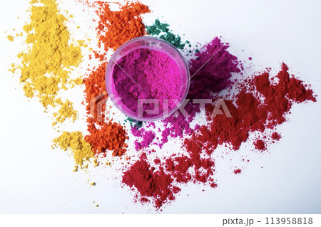 Colorful holi powder in a glass bowl isolated on white background. Colorful holi powder in a glass bowl isolated on white background. 113958818
