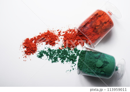Colorful holi powder in glass isolated on white background. 113959011