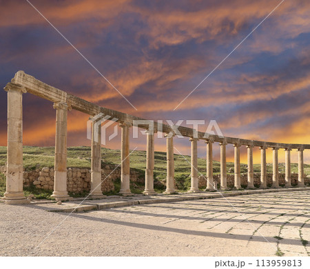 Forum (Oval Plaza) in Gerasa (Jerash), Jordan. Was built in the first century AD. Against the background of a beautiful sky with clouds. Forum (Oval Plaza) in Gerasa (Jerash), Jordan. Was built in the first century AD. Against the background of a beautiful sky with clouds. 113959813