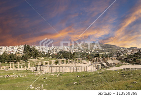 Forum (Oval Plaza) in Gerasa (Jerash), Jordan. Was built in the first century AD. Against the background of a beautiful sky with clouds. Forum (Oval Plaza) in Gerasa (Jerash), Jordan. Was built in the first century AD. Against the background of a beautiful sky with clouds. 113959869