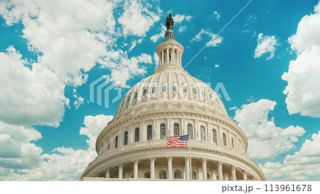 Dome of the Capitol building in Washington, DC. Clouds are swiftly floating on the building. Dome of the Capitol building in Washington, DC. Clouds are swiftly floating on the building. 113961678