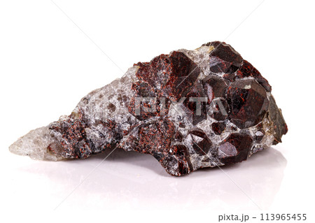 Macro stone garnet mineral on white background 113965455