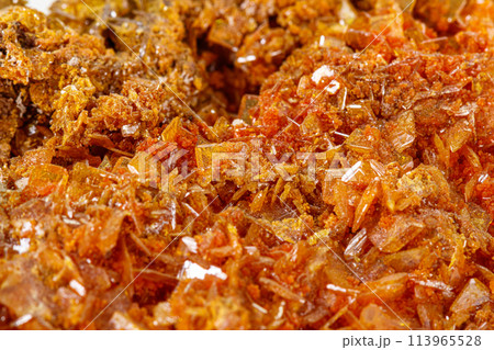 Macro stone mineral Wulfenite on a white background 113965528