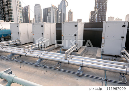 Heat pump Compressor hot water supply by heat exhanger to heating water for hotel or large commercial building roof top outdoor installation. Heat pump Compressor hot water supply by heat exhanger to heating water for hotel or large commercial building roof top outdoor installation. 113967009