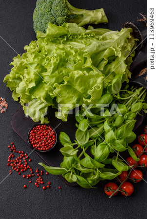 Fresh herbs basil in the form of a bush as an ingredient for cooking at home Fresh herbs basil in the form of a bush as an ingredient for cooking at home 113969468