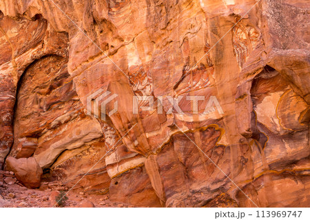 Sandstone rock and mineral layers in Petra, Jordan Sandstone rock and mineral layers in Petra, Jordan 113969747