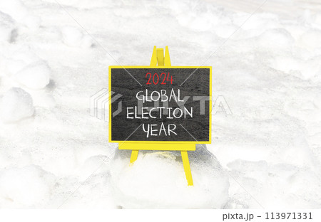 2024 global election year symbol. Concept words 2024 global election year on beautiful black chalk blackboard. Beautiful white snow background. Business 2024 global election year concept. Copy space 2024 global election year symbol. Concept words 2024 global election year on beautiful black chalk blackboard. Beautiful white snow background. Business 2024 global election year concept. Copy space 113971331
