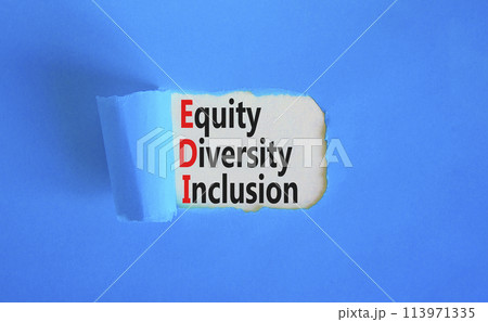 EDI equity diversity inclusion symbol. Concept words EDI equity diversity inclusion on white paper on beautiful blue background. Business EDI equity diversity inclusion concept. Copy space. 113971335