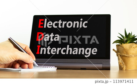 EDI electronic data interchange symbol. Concept words EDI electronic data interchange on black tablet. Beautiful white background. Business and EDI electronic data interchange concept. Copy space. 113971411
