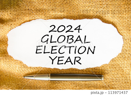 2024 global election year symbol. Concept words 2024 global election year on beautiful white paper. Beautiful canvas background. Black pen. Business 2024 global election year concept. Copy space 2024 global election year symbol. Concept words 2024 global election year on beautiful white paper. Beautiful canvas background. Black pen. Business 2024 global election year concept. Copy space 113971437