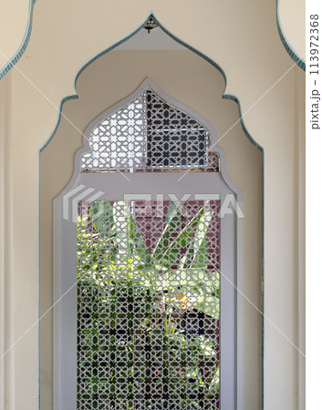 Interior diminishing perspective view with gable partitions wall inside Bang O mosque leading into Carved wooden wall. Interior diminishing perspective view with gable partitions wall inside Bang O mosque leading into Carved wooden wall. 113972368