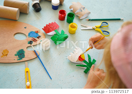 Kids craft flowers out of recycling toilet paper roll, zero waste concept. Step by step tutorial - 4. 113972517