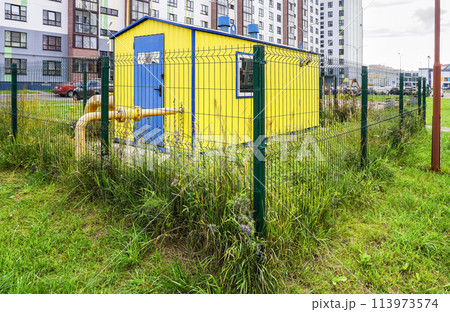 Gas control and distribution point in the courtyard of an apartment building 113973574