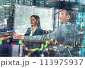 Businessman works on trading stock market chart on a computer 113975937