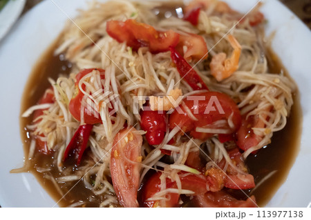 Som Tum, Thai papaya salad served on plate. Som Tum, Thai papaya salad served on plate. 113977138