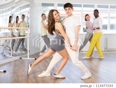 Young man and woman dancing latin dances Young man and woman dancing latin dances 113977293