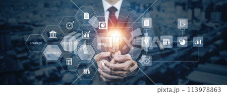 Businessman holding glowing light bulb with AI Data Management System on the computer, Hands working on a laptop cloud network graphic overlay, connected to the database. Corporate strategy finance Businessman holding glowing light bulb with AI Data Management System on the computer, Hands working on a laptop cloud network graphic overlay, connected to the database. Corporate strategy finance 113978863