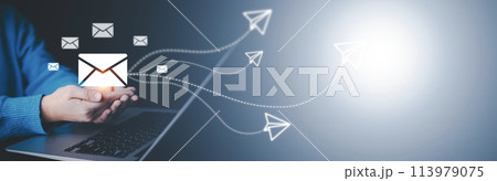 Business people working laptops with communication icons, letter icons, email icons, and newsletter email and protect your personal information or spam mail, Customer service call center contact. 113979075