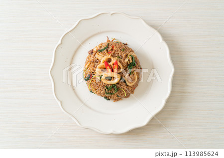 fried rice with squid and basil in Thai style fried rice with squid and basil in Thai style 113985624