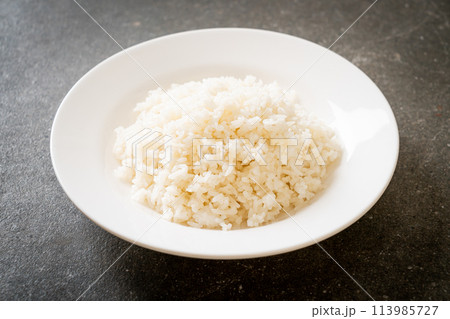 cooked rice on plate 113985727