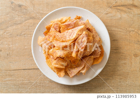 Taro Chips - fried or baked sliced taro Taro Chips - fried or baked sliced taro 113985953