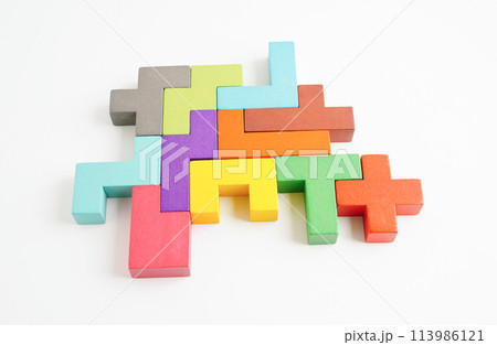 Logical thinking and problem solving problem solution creative business concept, wooden puzzle geometric block shape. Logical thinking and problem solving problem solution creative business concept, wooden puzzle geometric block shape. 113986121