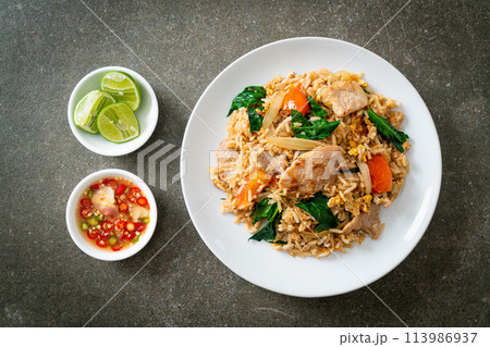 Fried rice with pork on plate 113986937