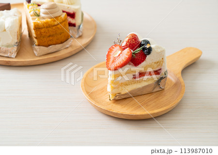 strawberry fresh cream cake on plate 113987010