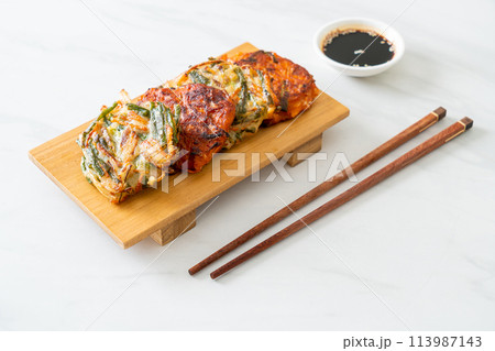 Pajeon or Korean pancake and Korean Kimchi pancake or Kimchijeon on white background 113987143