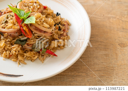 Basil and Spicy Herb Fried Rice with Squid or Octopus Basil and Spicy Herb Fried Rice with Squid or Octopus 113987221