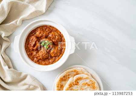 chicken tikka masala spicy curry meat food with roti or naan bread chicken tikka masala spicy curry meat food with roti or naan bread 113987253