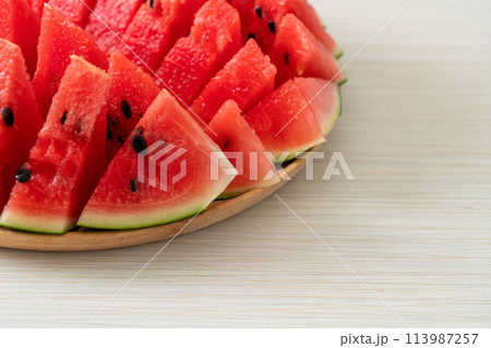 fresh watermelon sliced on plate 113987257