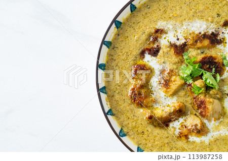 Afghani chicken in green curry or Hariyali tikka chicken hara masala 113987258