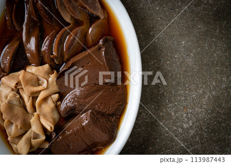stewed duck offal in brown soup stewed duck offal in brown soup 113987443
