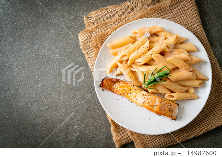 salmon with penne pasta cream sauce salmon with penne pasta cream sauce 113987600