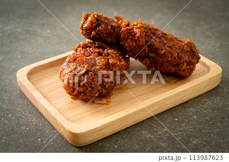 fried chicken with spicy Korean sauce fried chicken with spicy Korean sauce 113987623