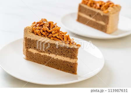 coffee almonds cake on plate 113987631