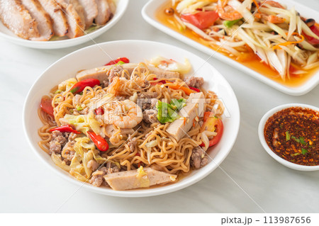 Instant noodles spicy salad on plate 113987656