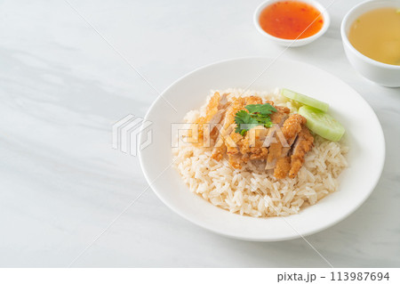 Steamed Rice with Fried Chicken or Hainanese Chicken Rice 113987694