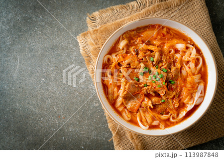 Korean udon ramen noodles with pork in kimchi soup Korean udon ramen noodles with pork in kimchi soup 113987848