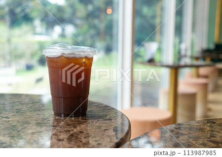 americano coffee on table in coffee shop 113987985