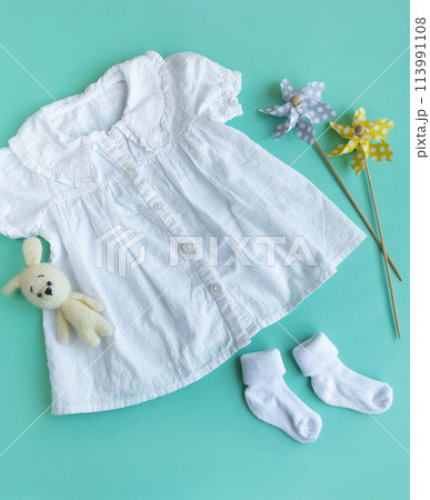 Baby dress for little girl, shoes, knitted toy and accessories. 113991108